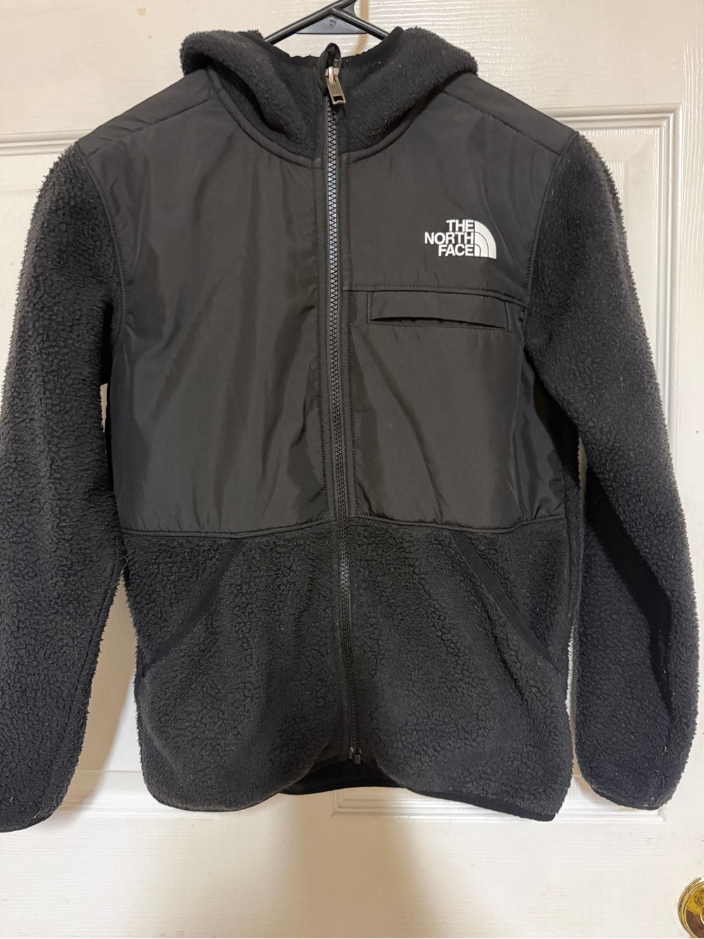 The North Face Kids Black Hooded Sherpa Fleece Jacket with Chest Pocket